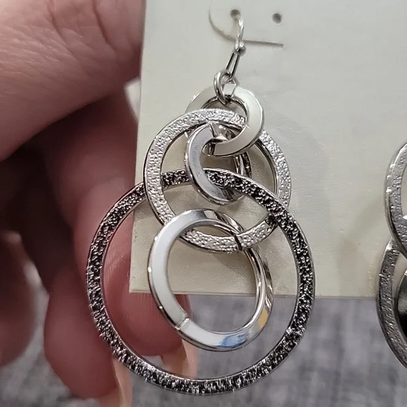 Bold Elements Silver Hoop Earrings - Picture 2 of 2